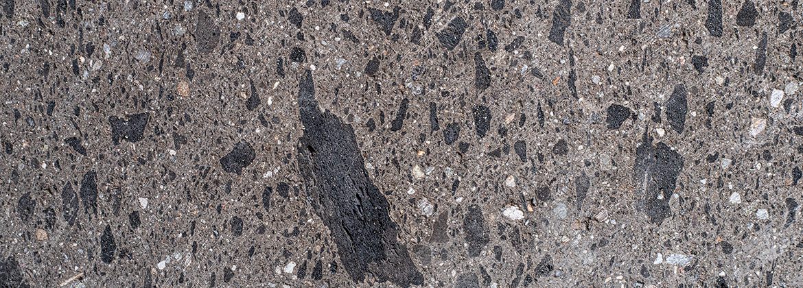 Chocolate quarry stone slab facade